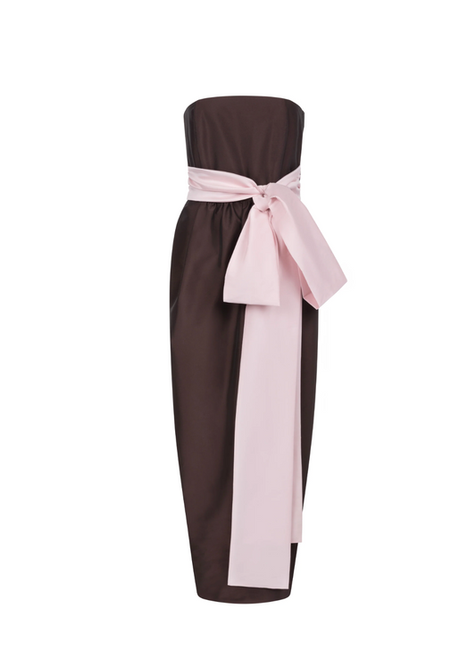 Brown and pink strapless dress with a wide belt on a white background