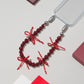 Pave Bow Wristlet Garnet