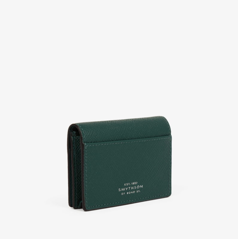 A dark green textured leather bi-fold wallet with white printed brand lettering on the front, shown on a plain white background.