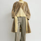 Collarless Shearling Coat
