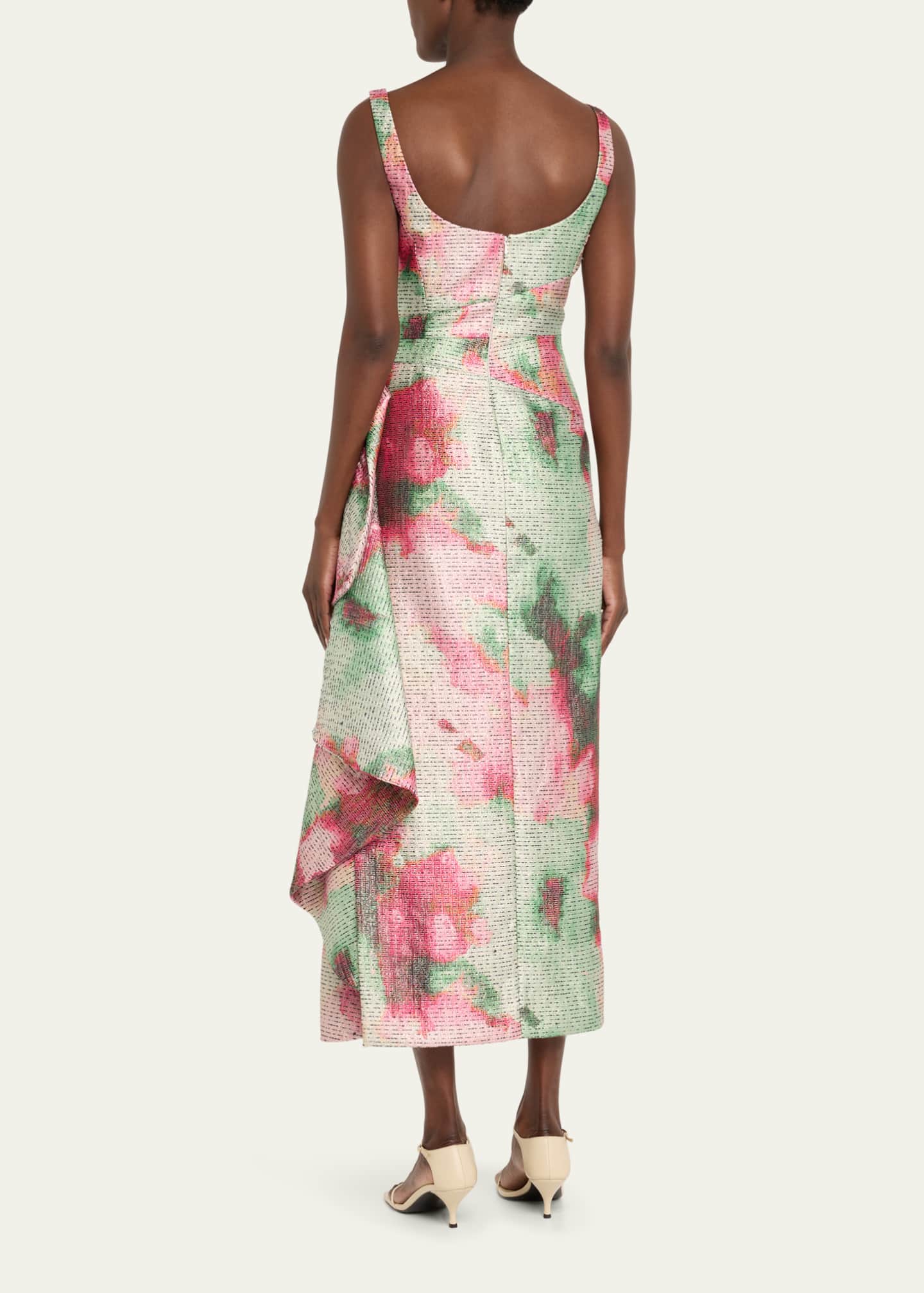 Woman wearing a floral dress with a white background